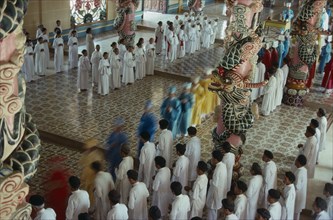 VIETNAM, South, Tay Ninh Province, The Cao Dai Holy See procession of priests in the main temple