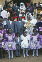 UGANDA, Kampala, Wedding party outside Rubaga Cathedral