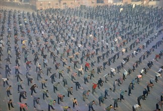 CHINA, Beijing, Looking over mass exercise class from elevated viewpoint.