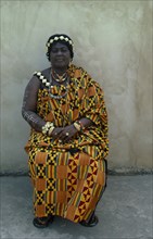GHANA, Kumasi, Portrait of the Queen Mother wearing traditional Ashanti cloth.