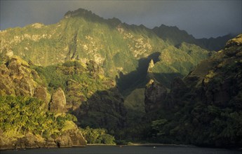 PACIFIC ISLANDS, Polynesia, Marquesas Islands, Fatu Hiva Island.  Landscape near Hanavave at sunset