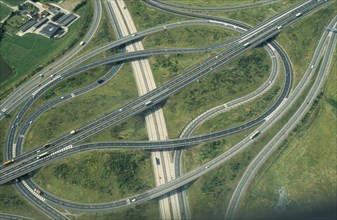 ENGLAND, Essex, Transport, Aerial view of junction on the M25 and M11 motorways at Epping