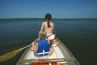 FAMILY, Children, Mother and Child, Mother and daughter canoeing on the Westport River in