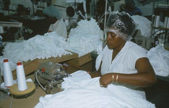 JAMAICA, Montego Bay, Industry, Workers in garment factory in Free Zone making t shirts.