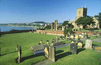 ENGLAND, Yorkshire, Scarborough, Grave of Anne Bronte in a graveyard at St Marys Church overlooking