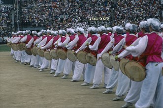 SOUTH KOREA, Seoul, Line of musicians with drums at Childrens Day celebrations.