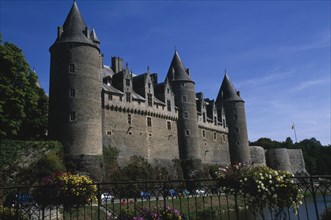 FRANCE, Brittany, Morbihan, Josselin. View of castle exterior.
