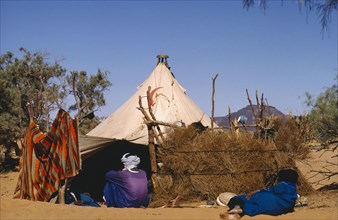 ALGERIA, People, Tuaregs outside tent.