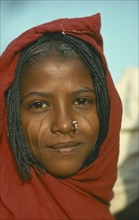 SUDAN, Tribal People, Portrait of a young Eritrean woman with scarified cheeks and a nose ring