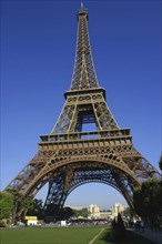 FRANCE, Ile de France, Paris, The Eiffel Tower against a blue sky