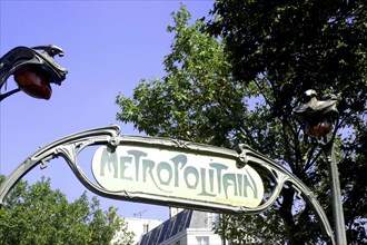FRANCE, Ile de France, Paris, Art Nouveau style Metropolitain sign in green wrought iron