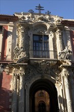 SPAIN, Andalucia, Seville, Santa Cruz District. Baroque doorway of the Palacio Arzobispal