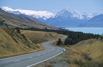 NEW ZEALAND, South Island, Lake Pukaki, View looking north along the lake and road running to Mount