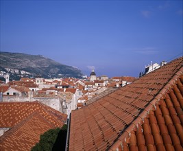 CROATIA, Dalmatia, Dubrovnik, View over tiled rooftops toward the Cathedral dome