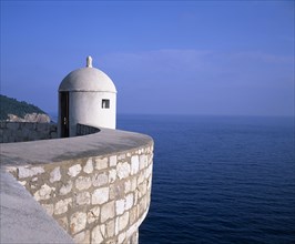 CROATIA, Dalmatia, Dubrovnik, City Wall or Gradske Zidine overlooking the Adriatic Sea and Kolocep