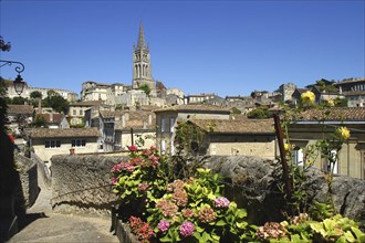 FRANCE, Aquitaine, Bordeaux, View over old town rooftops toward a church spire