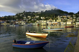 WEST INDIES, St Vincent, View over moored boats in Kingston Harbour toward the waterfront