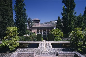SPAIN, Andalucia, Granada, Alhambra Palace. The Alcazaba. Jardins de Partal with the Palace of the