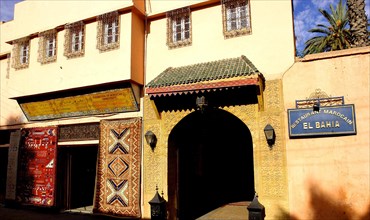 MOROCCO, Marrakech, Morocain Restaurant facade and sign with entrance arch