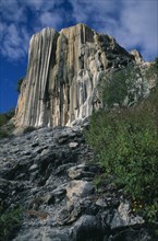 MEXICO, Oaxaca, Hierve el Agua, Cliff formed by limestone deposits from mineral springs