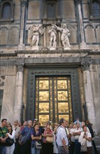 ITALY, Tuscany, Florence, Tourists at Baptistry doors.