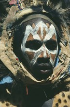 KENYA, Body Decoration, Kikuyu tribesman with painted face.