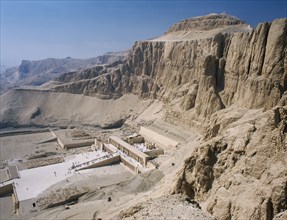 EGYPT, Nile Valley, Thebes, Temple of Hatshepsut. Elevated view over temple and limestone cliffs