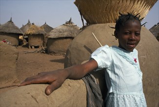 BURKINA FASO, Bisaland, Sigue Voisin Village, Young girl in village near Garango.