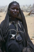 NIGER, People, Women, Young Touareg woman.  Head and shoulders portrait.