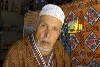 MOROCCO, Marrakech, Portrait of a local man in a shop