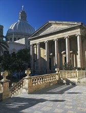 MALTA, Valletta, St Pauls Anglian Cathedral with Dome of carmelite Church behind.