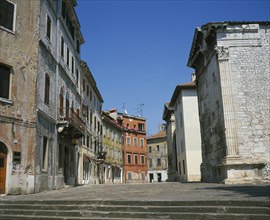 CROATIA, Istria, Pula, Street on the site which was once the Roman Forum at the back of the Temple