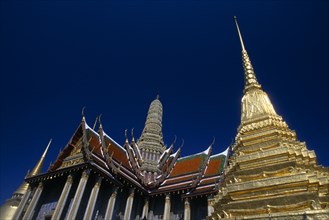 THAILAND, Bangkok, Grand Palace. Detail of roof at Prasad Phra Theipidon Royal Pantheon.