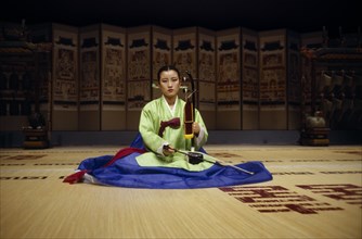 SOUTH KOREA, Arts, Woman playing traditional stringed instrument