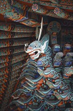 SOUTH KOREA, Suwan, "Pulguk-Sa Temple, detail of roof and carving."