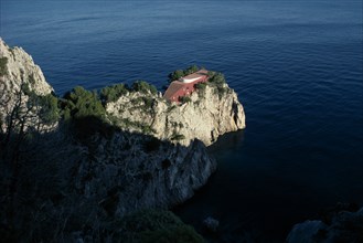 ITALY, Campania, Capri, Cap Massulo. Villa Malaparte. Red building built at the end of a cliff