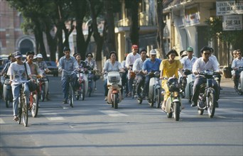VIETNAM, South, Ho Chi Minh City, Mopeds and cyclists