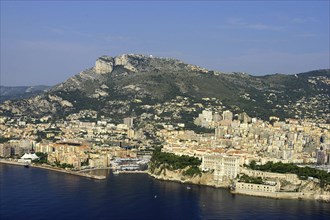 MONACO, Cote d Azur, Monte Carlo, Aerial view from the sea toward the coastal city and coastline