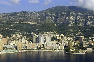 MONACO, Cote d Azur, Monte Carlo, Aerial view from the sea toward the coastal city
