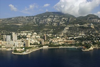 MONACO, Cote d Azur, Monte Carlo, Aerial view from the sea toward the coastal city
