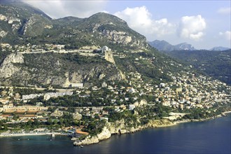 MONACO, Cote d Azur, Monte Carlo, Aerial view from the sea toward the hillside coastal city and