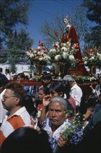 MEXICO, Guanajuato, San Miguel de Allende, Easter procession from Templo de San Juan de Dios.