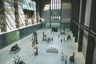 ENGLAND, London, Tate Modern. View over the Old Turbine Hall with modern sculpture exhibits