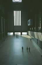 ENGLAND, London, Tate Modern. View over the Old Turbine Hall main entrance with scattered visitors