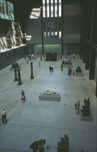 ENGLAND, London, Tate Modern. View over the Old Turbine Hall with modern sculpture exhibits and