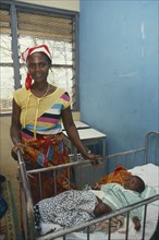 GHANA, Euchi, Woman and her baby in a ward of the local hospital