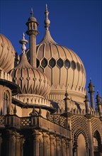 ENGLAND, Sussex, Brighton, Brighton Pavilion exterior section showing onion domes in evening light