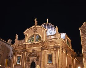 CROATIA, Dalmatia, Dubrovnik, Church of St Blaise Baroque facade illuminated at dusk