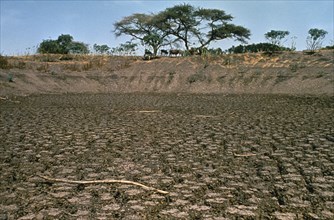 ETHIOPIA, Environment, Drought, "Dried up waterhole, erosion and cracked mud ground"