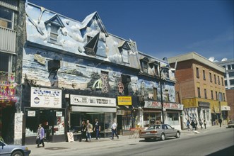CANADA, Quebec, Montreal, Shops with colourfully decorated exterior